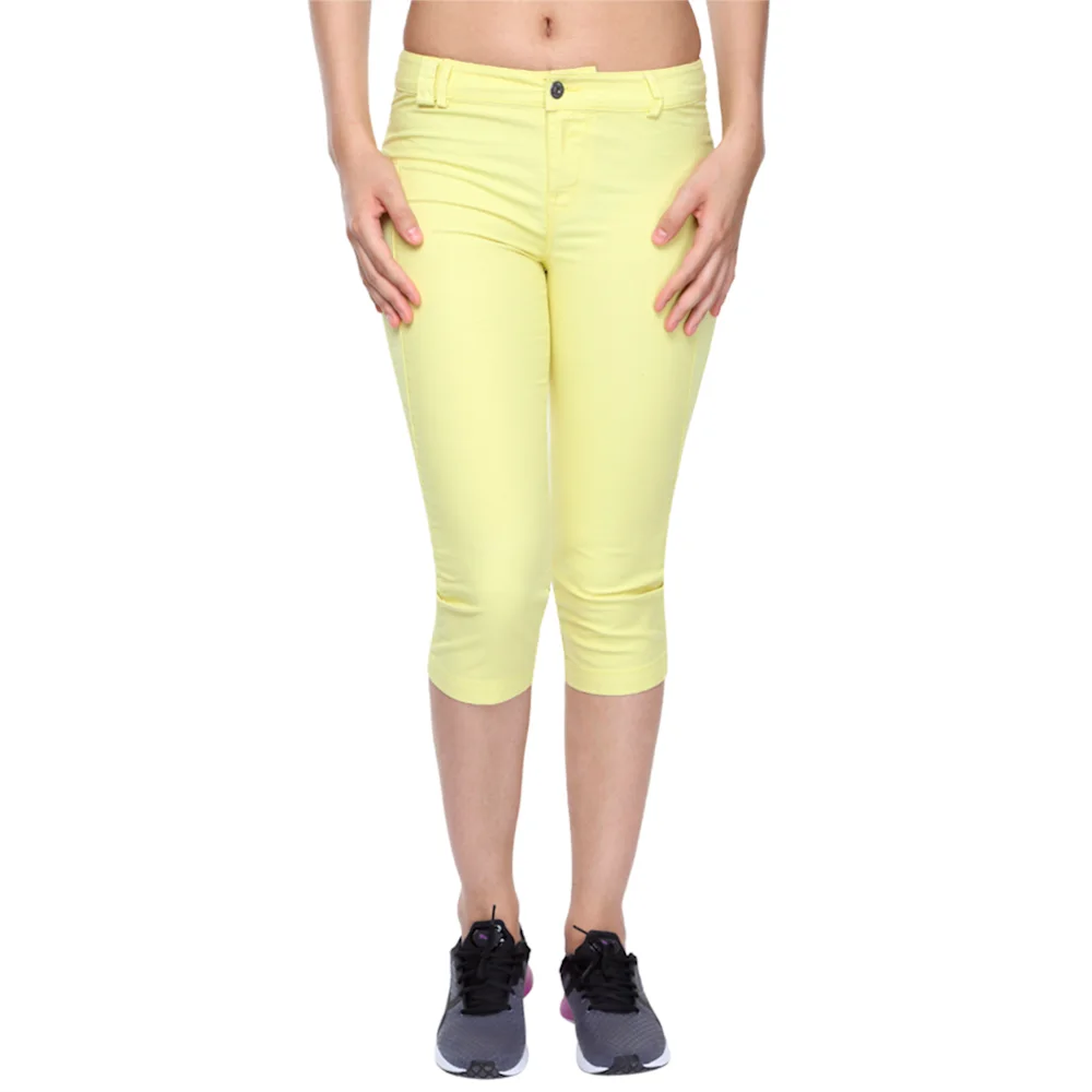 PUMA CAPRI PANTS YELLOW IRIS in Standard