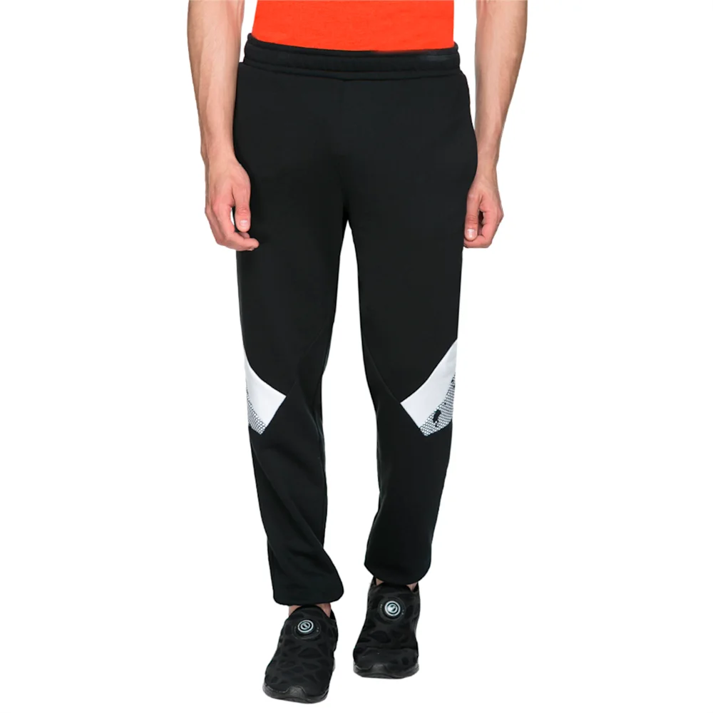 PUMA DISC TRACK PANTS COTTON in BLACK