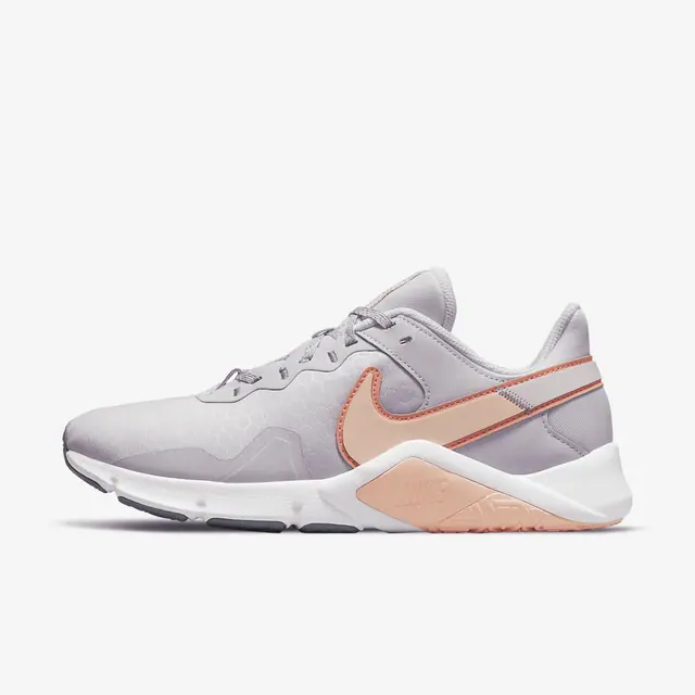 W NIKE LEGEND ESSENTIAL 2 in VENICE/CRIMSON BLISS-CRIMSON TINT