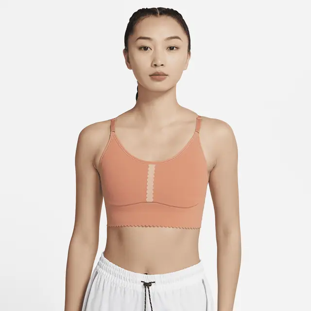 NIKE AS W NY DF INDY LL EYELET BRA in HEALING ORANGE/A