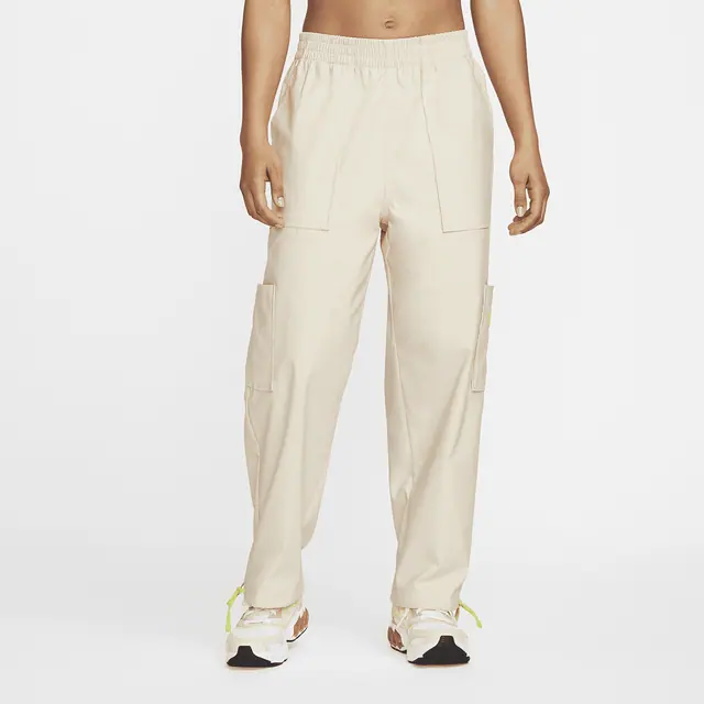 NIKE AS W NSW IC MR WVN PANT in SANDDRIFT/ATOMIC GREEN
