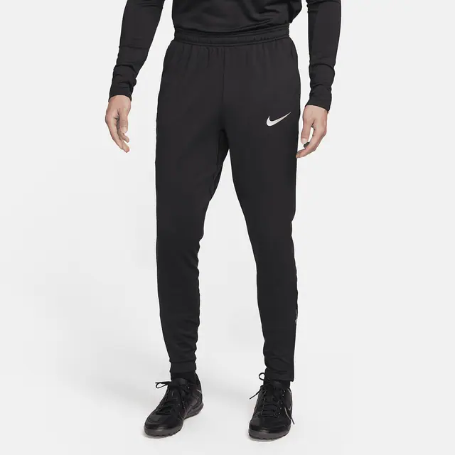 NIKE AS M NK DF STRK PANT KPZ in BLACK/BLACK/JERSEY GOLD/METALLIC GOLD